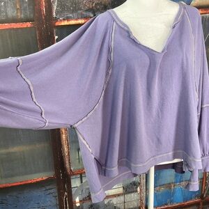 Free People "Wish I Knew" Oversized V-Neck Tee – Relaxed Fit with Exposed Seam